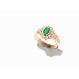 A Ladies’ Ring with 1 Emerald and 16 Diamonds, 18K Yellow Gold 18 karat yellow gold (tested)