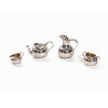 A 4 Piece Silver Service, Goldsmiths & Silversmiths London 1903 Sterling silver, embossed, chiseled,