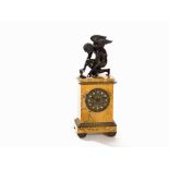 Charles X. Clock, 'Love catching the Butterfly', France, 19th C Giallo di Siena marble, brass,