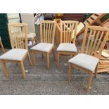 four dining chairs.