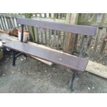 A garden bench with cast iron ends.