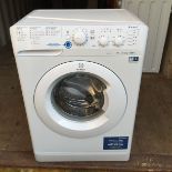 An Indesit XWSC61251 washing machine.