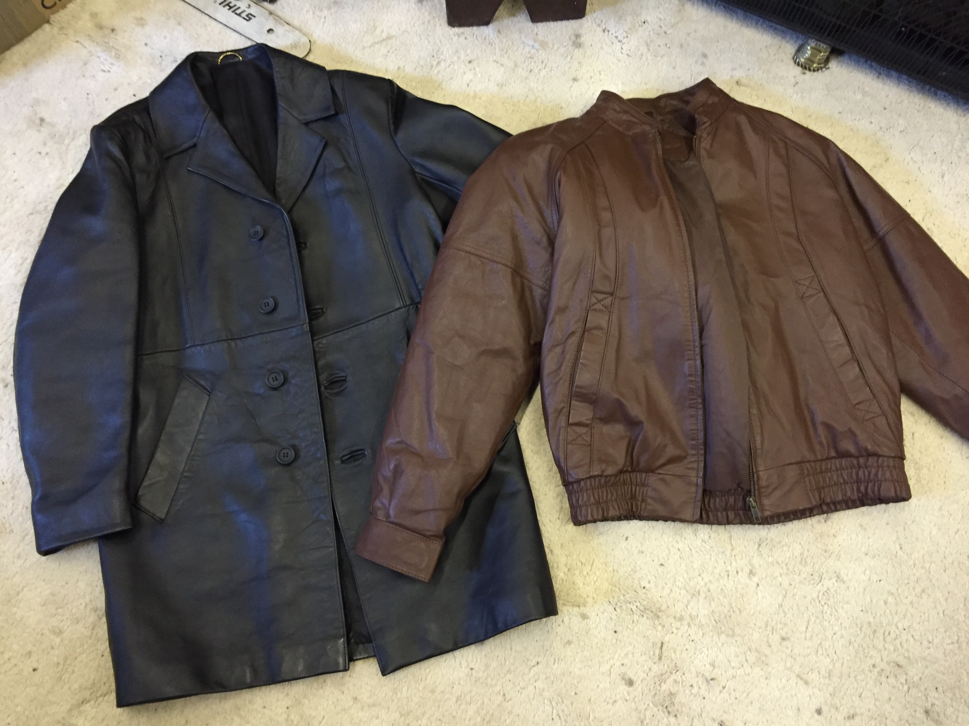 A bomber style brown leather jacket small and a black leather coat S 38.