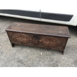 An oak six plank sword chest with carved frieze to front 490 mm x 1230 mm x 400 mm