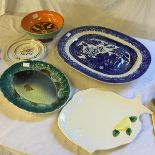 A Poole pottery bowl and other ceramic plates.