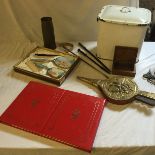 An enamel bred bin, a dressing table brush set, pokers and others.