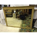 A large over mantle mirror with bevel edge .