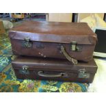 Two vintage suitcases.