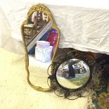 A gilt framed mirror and a circular metal framed mirror.