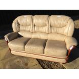A brown leather sofa in excellent condition.