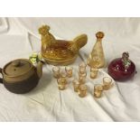 A selection of ceramics including an egg Hen a Sylvac onion jar a decorated decanter and shot