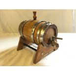A wooden miniature Whisky barrel.