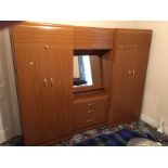 Two double wardrobes and a dressing table.