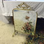 A mirrored fire screen.