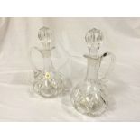 A pair of lead crystal decanters.