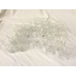 Glasses including a set of eight tumbler