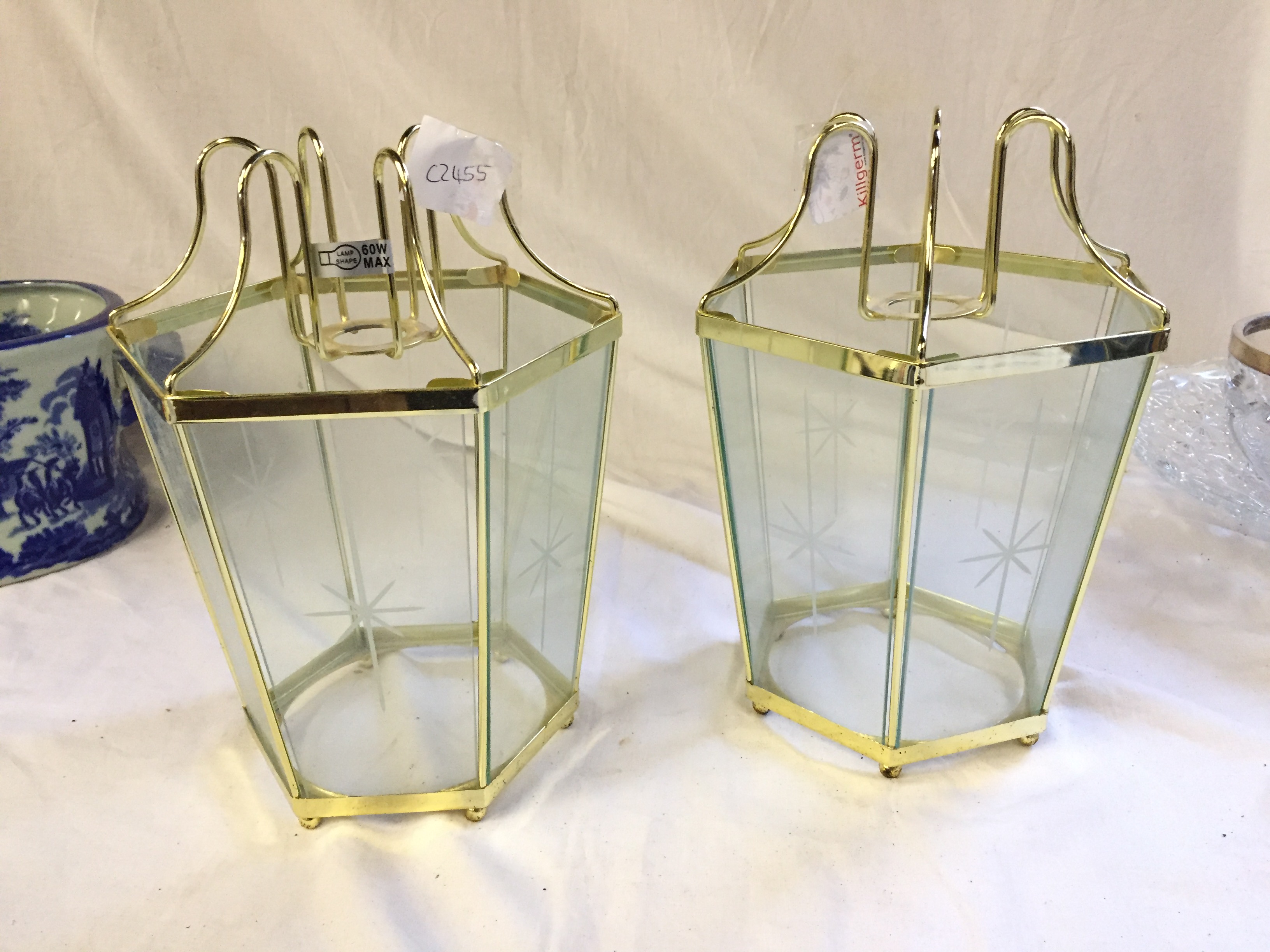 A pair of glass light shades.