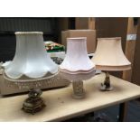 Three table lamps.