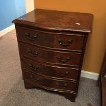 A small chest of four drawers.