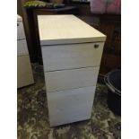 A filing cabinet with drawers.