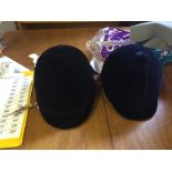 Two riding hats unused as shown.