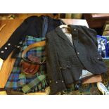A kilt two jackets two sporrans a belt and others.