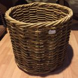 A wicker log basket.