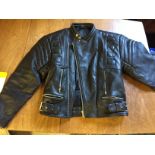 A bikers leather jacket medium.