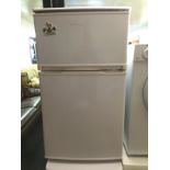 A counter top fridge freezer.