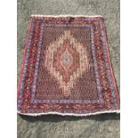 A wool rug 1550 mm x 1230 mm