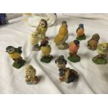Miniature bird figures various.