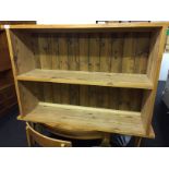 A two shelf pine bookcase.