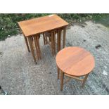 A side table with four fold away circular tables.