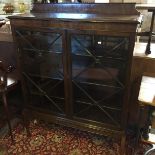 An astral glazed bookcase.