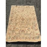 A wool rug 1840 mm x 1290 mm