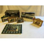Seven boxed collectable toy cars including A Ferrari 550 Maranello (1996) and a Historic Cars coin