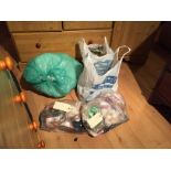Four bags of crafting or quilting materials.
