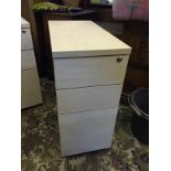 A filing cabinet with drawers.