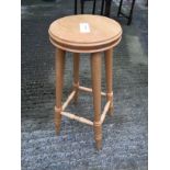 A pine kitchen / bar stool.