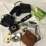 A selection of cameras and accessories.