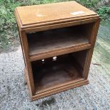 An oak music cabinet.