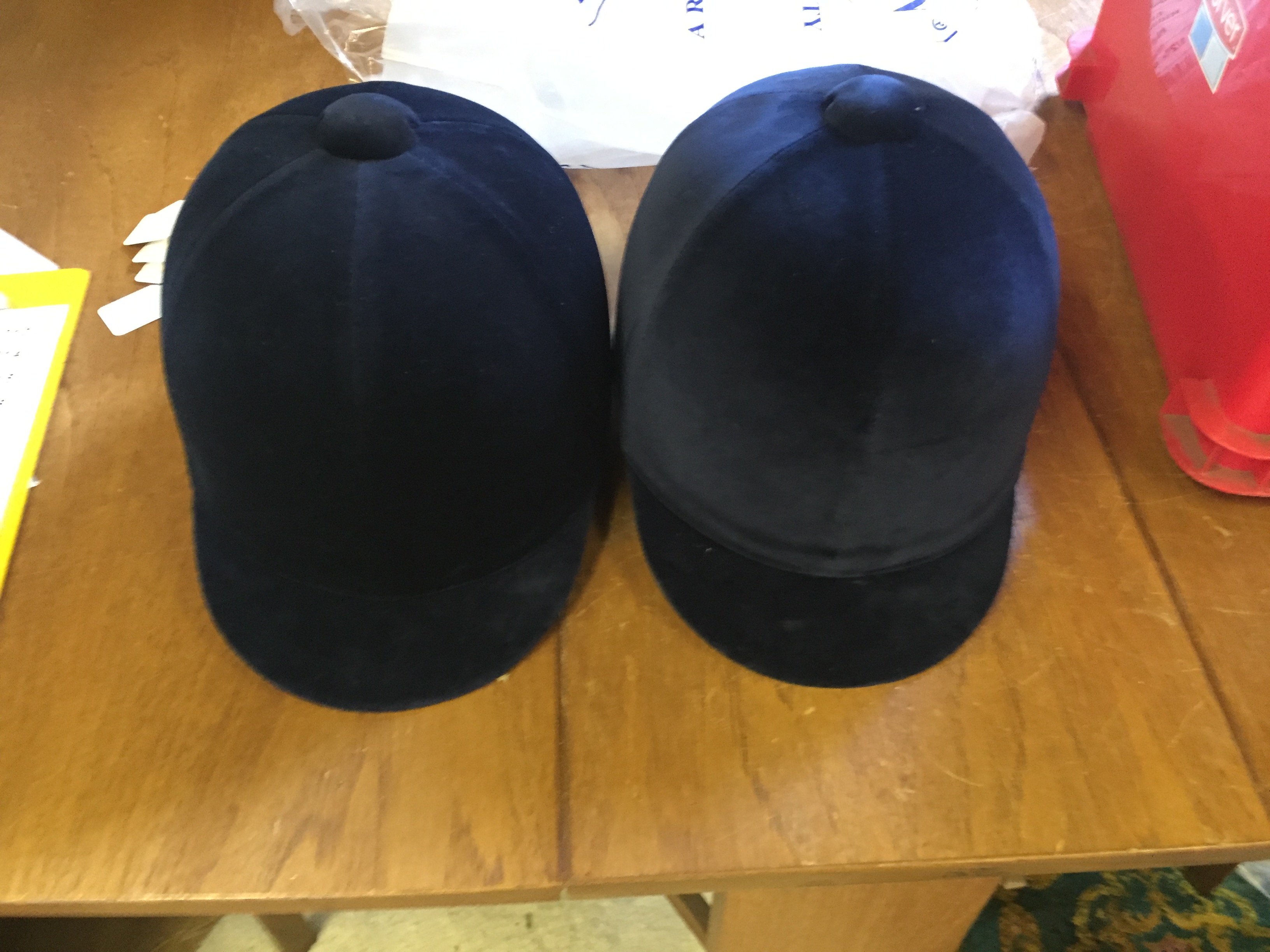 Two riding hats unused as shown.