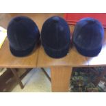 Three riding hats unused as shown.