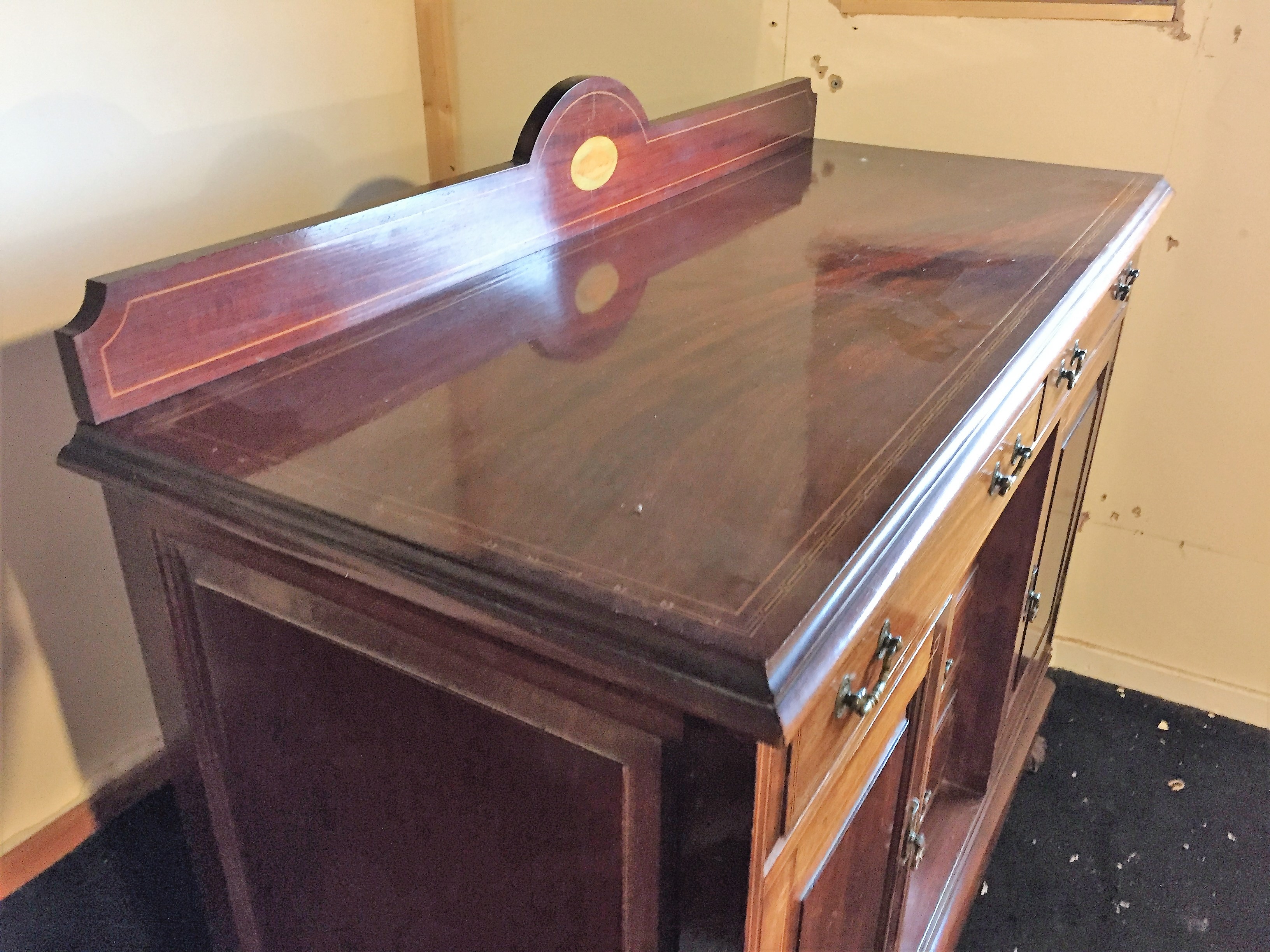 A sideboard with two drawers over two side cupboards and three central drawers. - Image 2 of 3