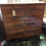 A Victorian flame veneer chest of drawers with two short over three long
