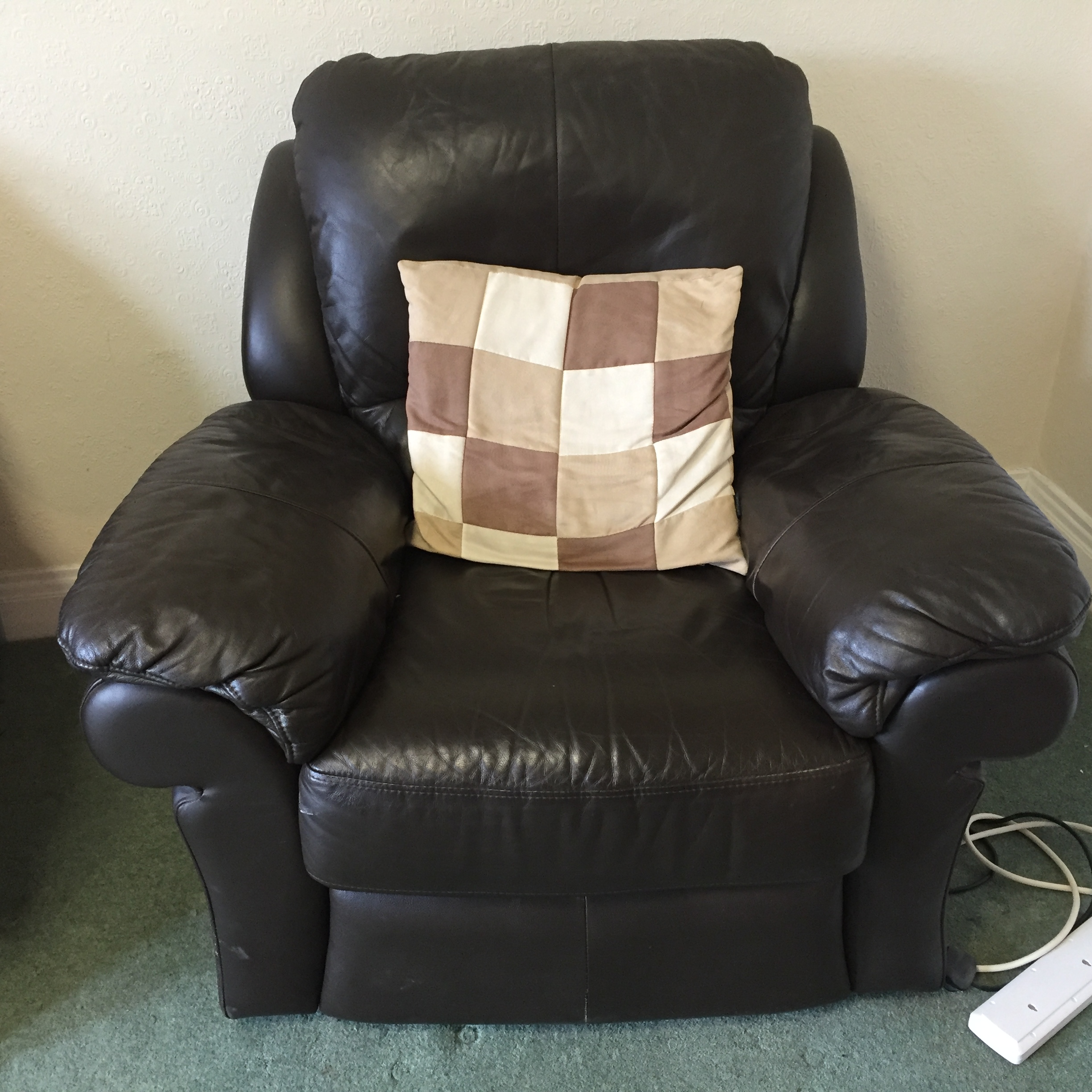 An electric leather recliner.