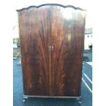 A dark wood vintage wardrobe on Queen Anne feet by Beithcraft Ayrshire.