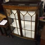 An astral glazed China cabinet.