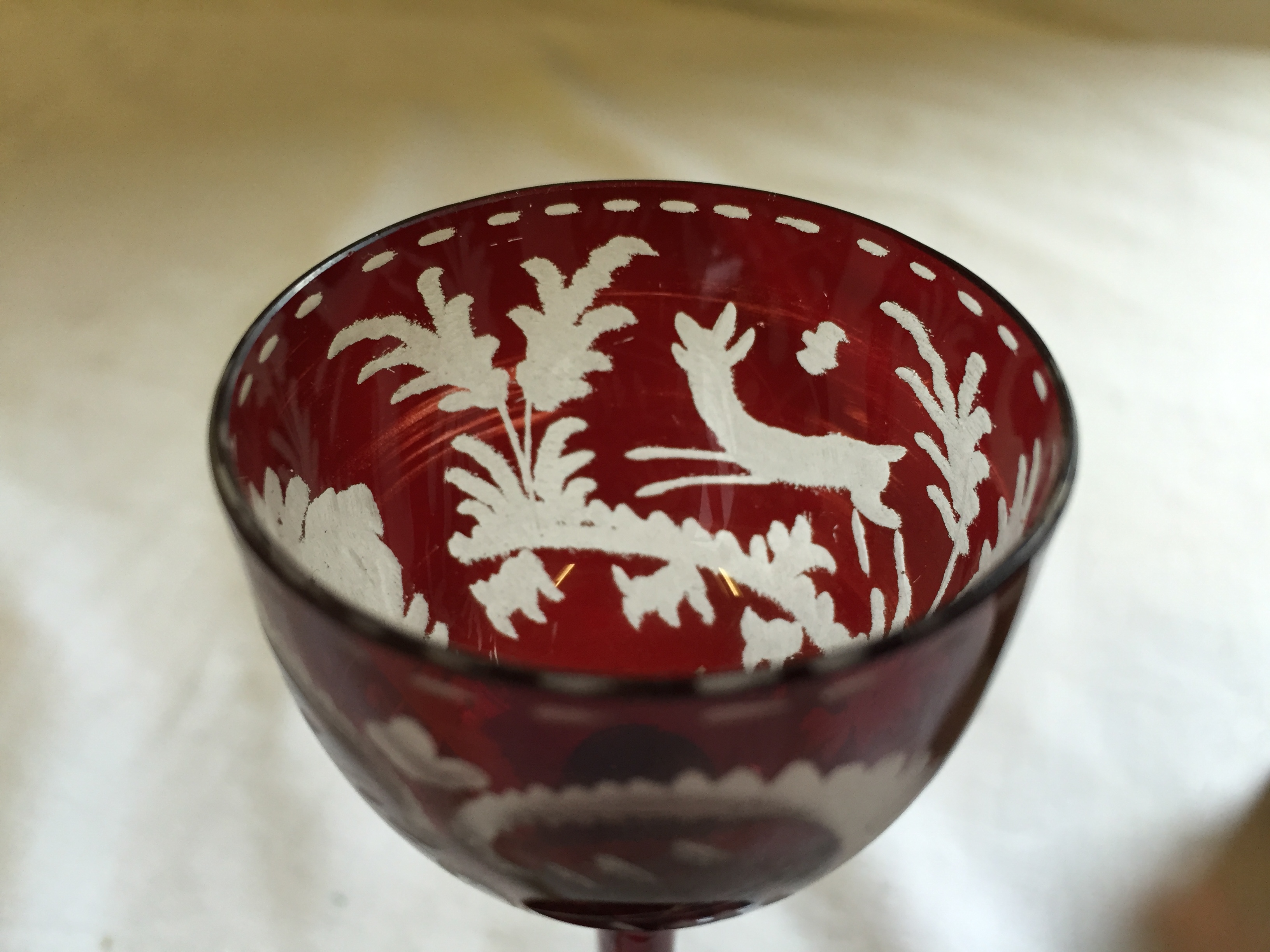 Four Bohemian ruby etched liquor glasses. - Image 4 of 4