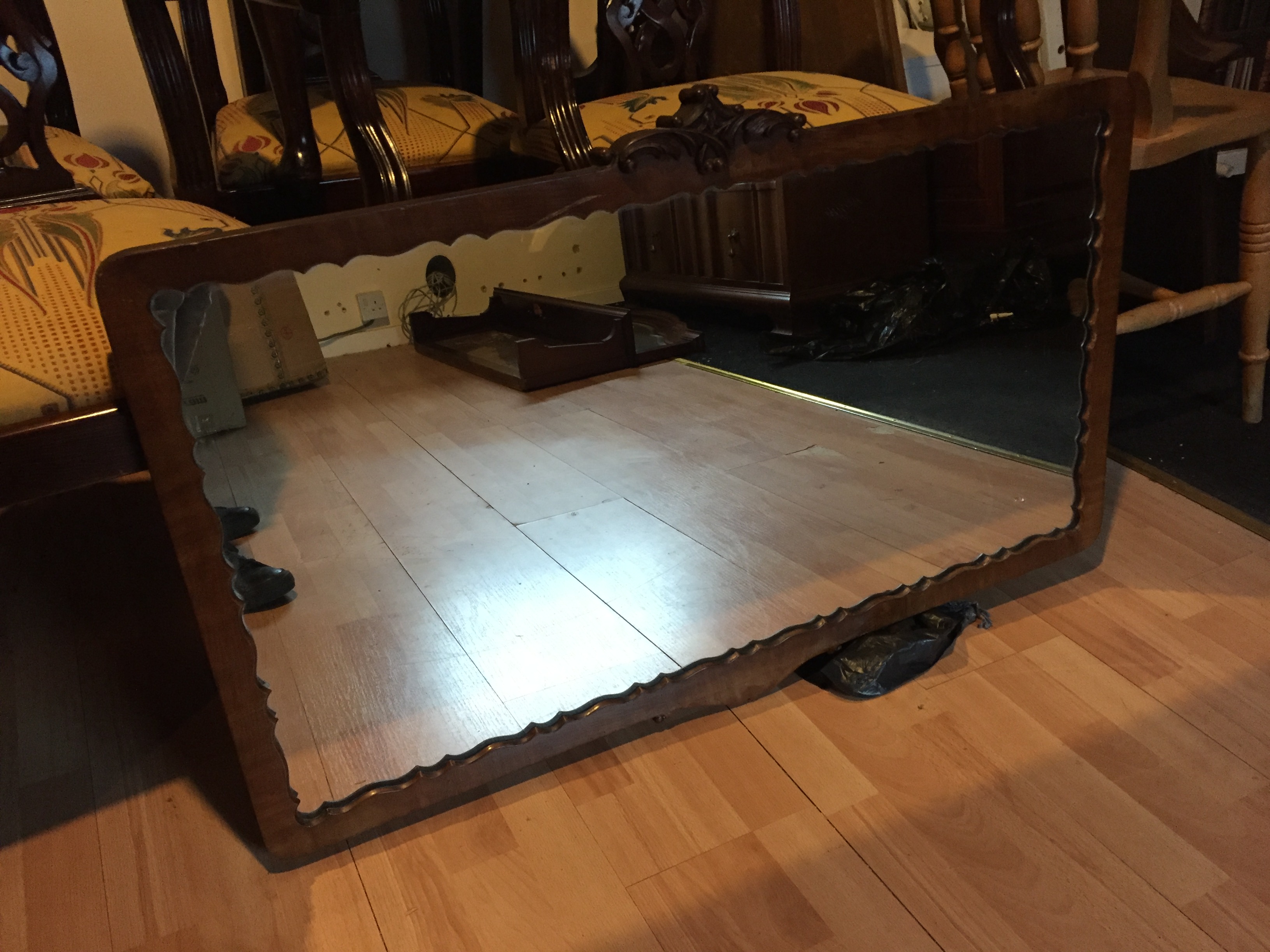 A large over mantle mirror.